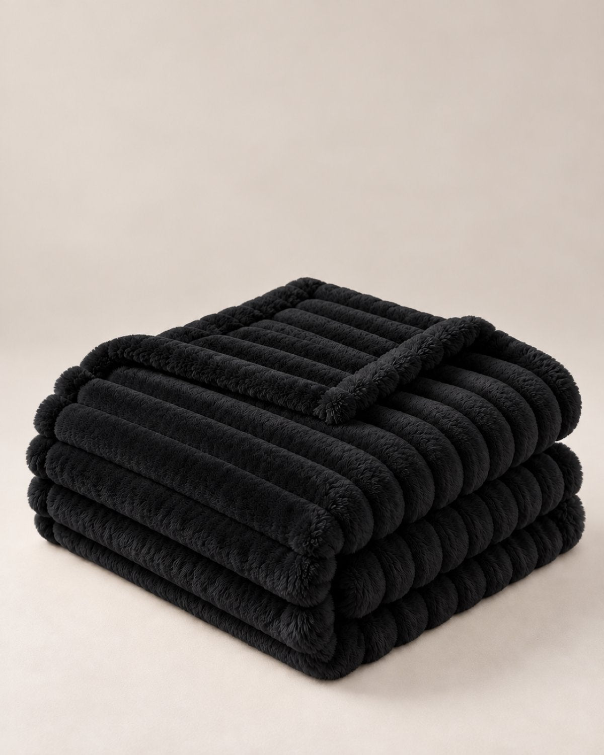 Plaid polaire côtelé Douillette, coloris noir, plié