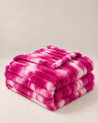 Plaid polaire côtelé Douillette, coloris tie-dye fuchsia, plié