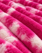 Plaid polaire côtelé Douillette, coloris tie-dye fuchsia, gros plan sur la maille côtelée