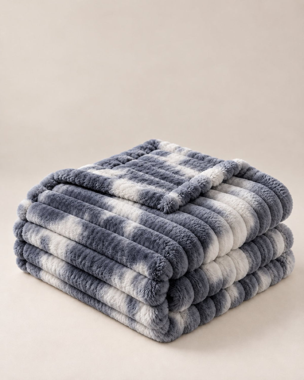 Plaid polaire côtelé Douillette, coloris tie-dye gris, plié