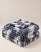 Plaid polaire côtelé Douillette, coloris tie-dye gris, plié