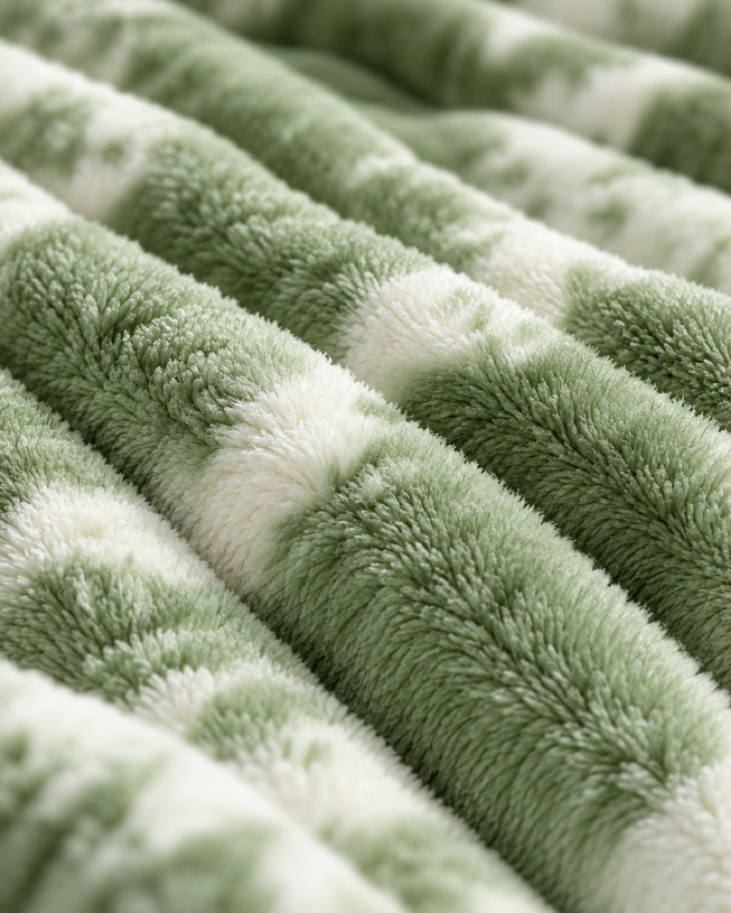 Plaid polaire côtelé Douillette, coloris tie-dye vert, gros plan sur la maille côtelée