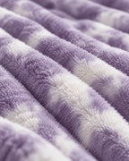 Plaid polaire côtelé Douillette, coloris tie-dye violet, gros plan sur la maille côtelée